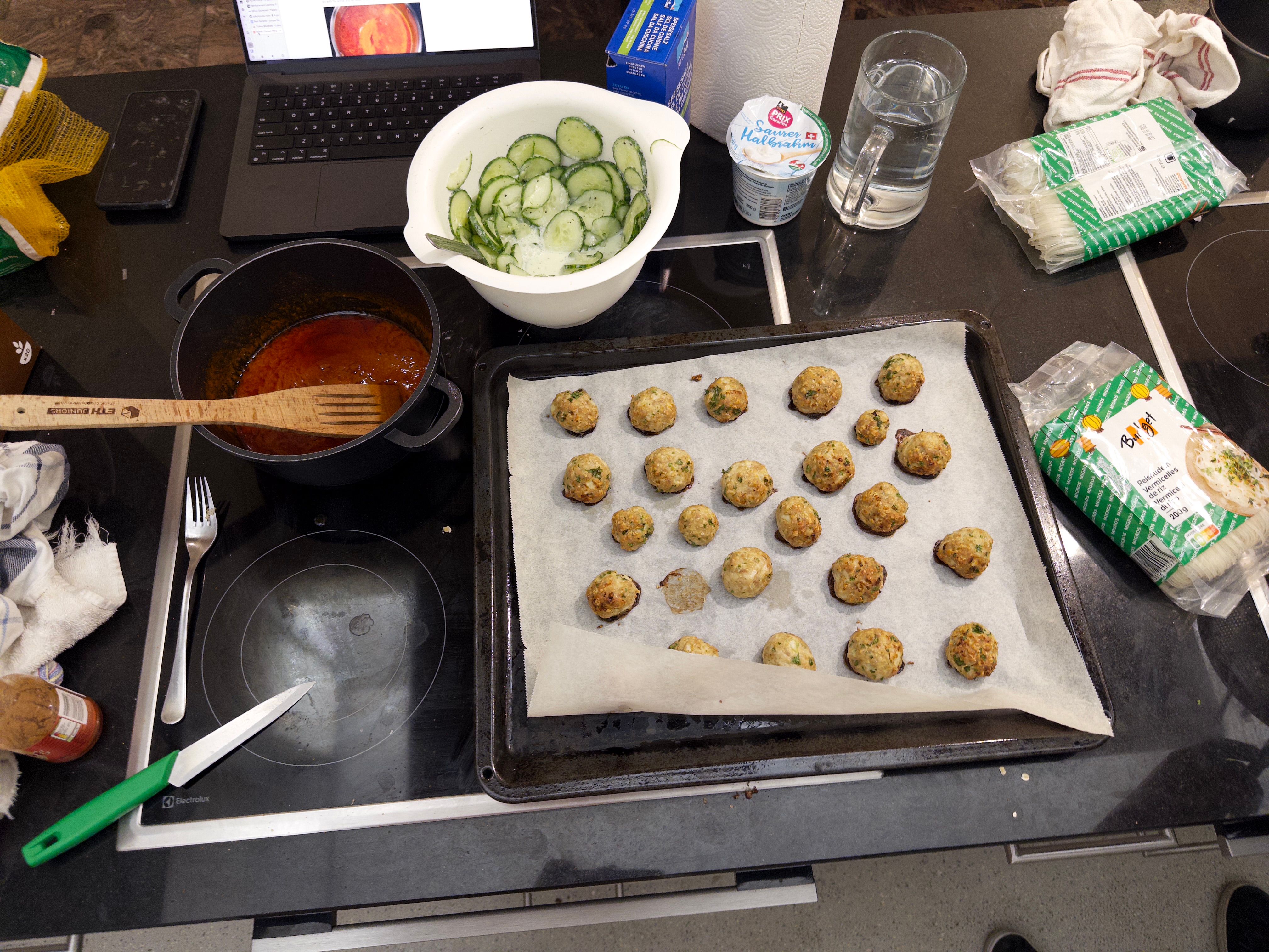 Chicken meatballs with buffalo sauce and a cucumber salad