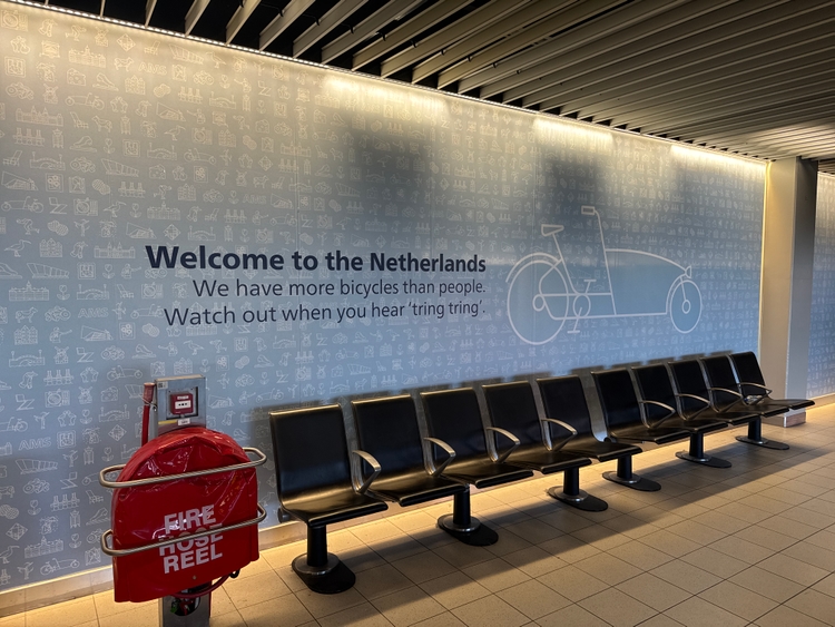 A sign that says "Amsterdam has more bikes than people"