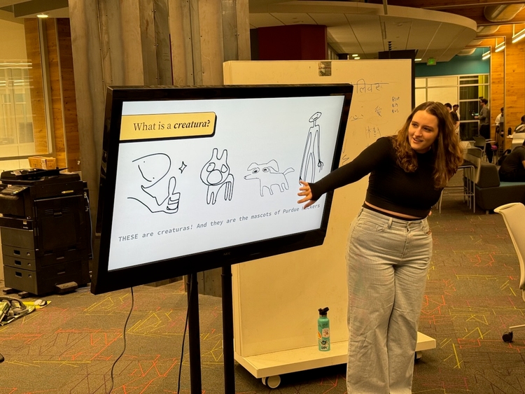 Becca hosting a session on creaturas at Hack Night 4.2.