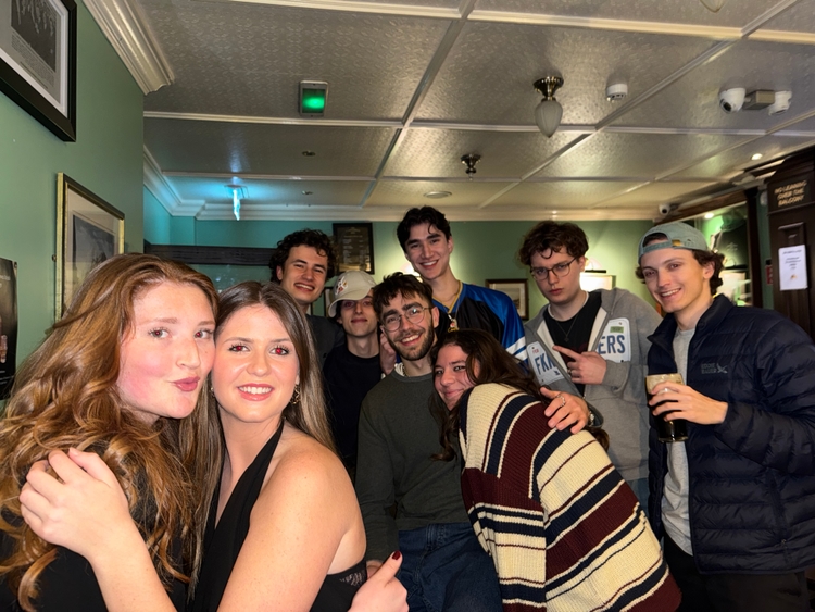 Pam, Kadin, Mo, Tom, Mo's friend Jack, Ioli, Zack, Max, and Ryan at a bar