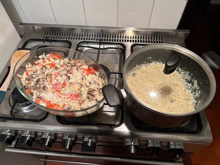 A fish and rice dinner on the stove