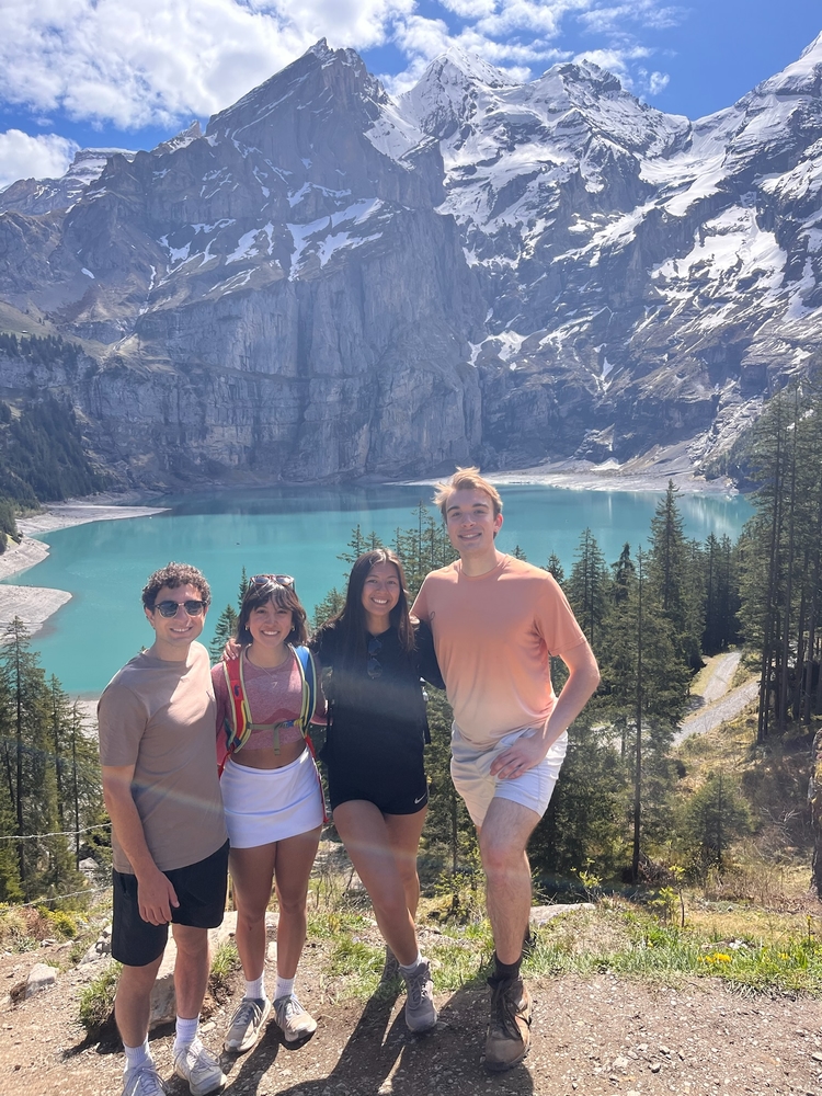 Adam, Nadia, Kate, and I posing in front of the lake