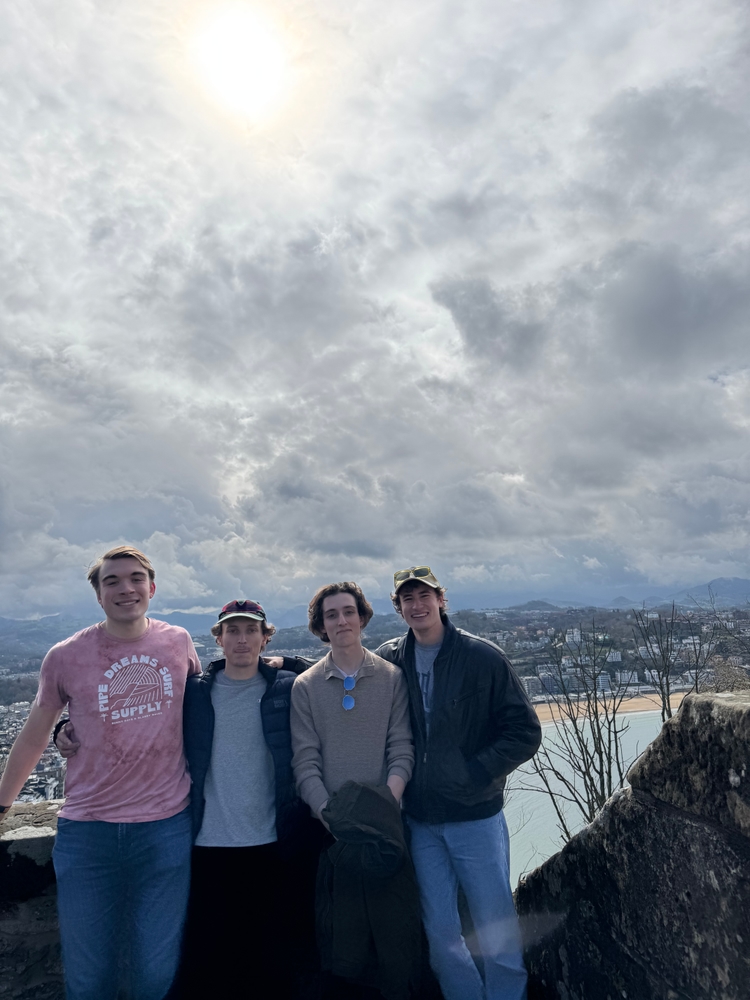 Me, Ryan, Tom, and Mo with the city behind us
