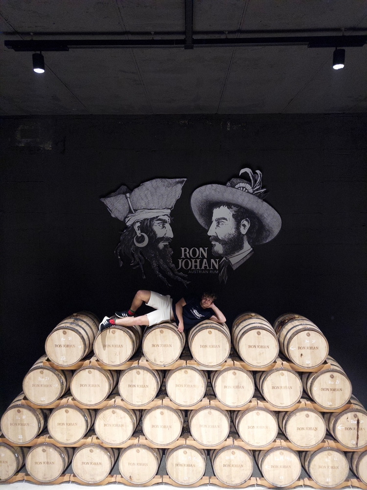 Ben posing on some whiskey barrels